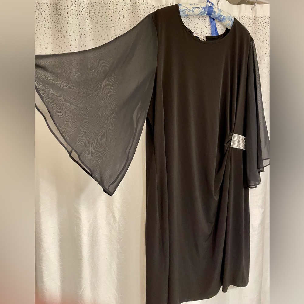 Semi-formal midi black dress, flowy style & gorgeous rhinestone detail at waist.